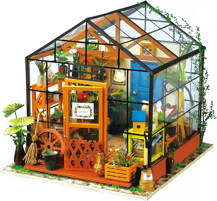 Model of a miniature greenhouse with indoor plants and furniture. 1.24 scale miniature size