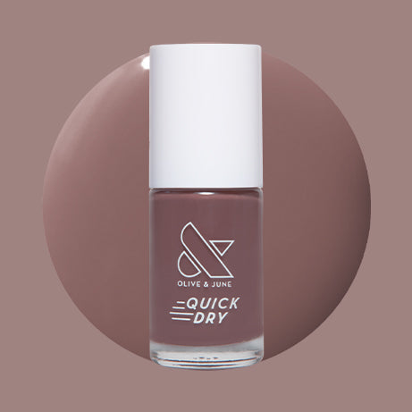 Olive and June Sable quick dry gel polish bottle shown with warm milky chocolate polish swatch on neutral background