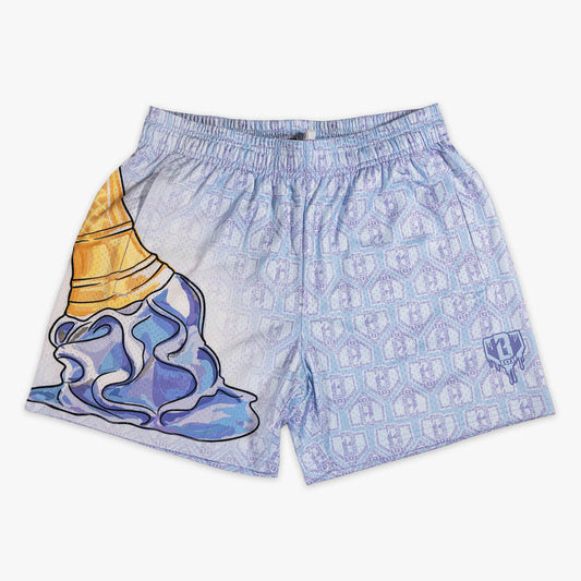 Youth model wearing youth shorts with "Scoop SZN" design