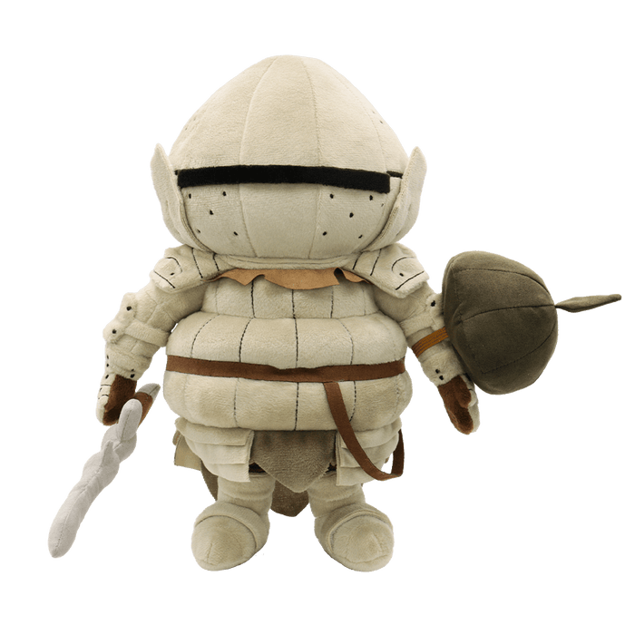 The official Siegmeyer plush against a transparent background, showing its magnetically attached plush sword and elastic-banded plush shield accessories.