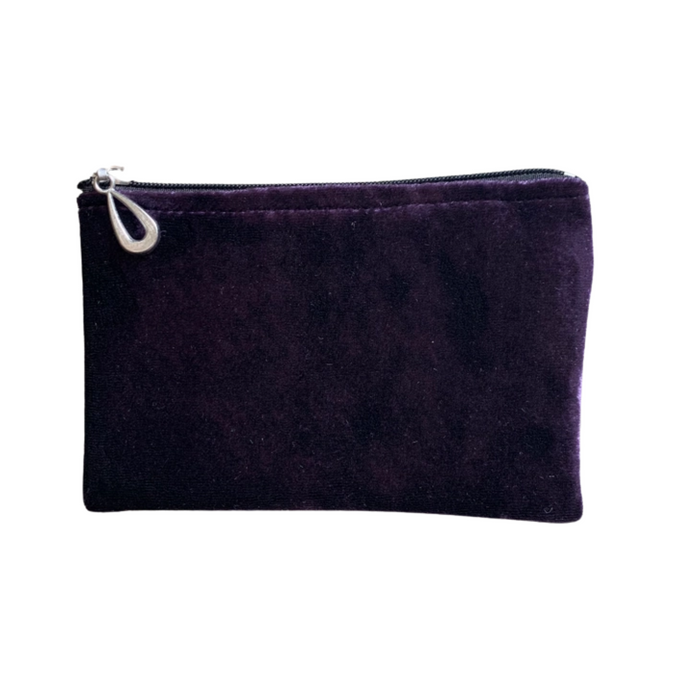 Small silk velvet pouch in orchid-purple with zip top and teardrop zipper pull.