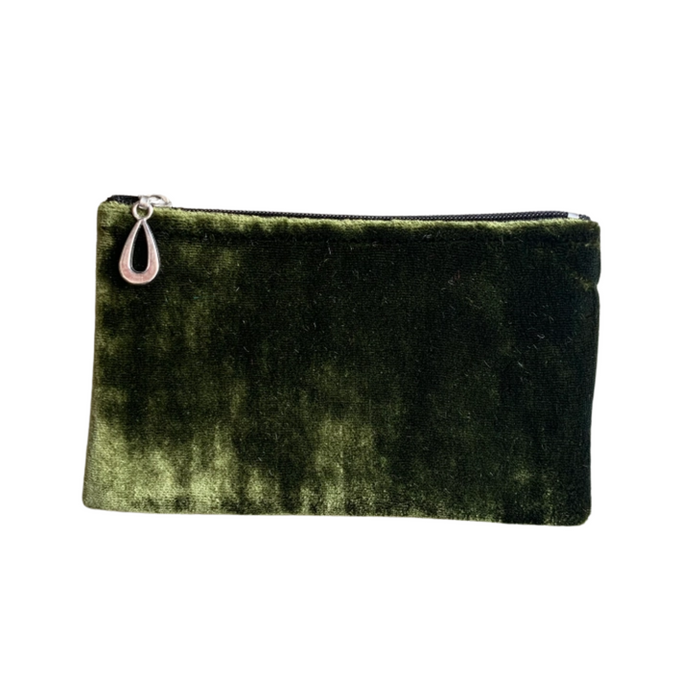Small silk velvet pouch in pine green with zip top and teardrop zipper pull.