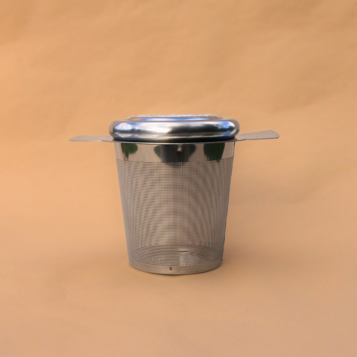 Flora & June's stainless steal tea infuser in silver.