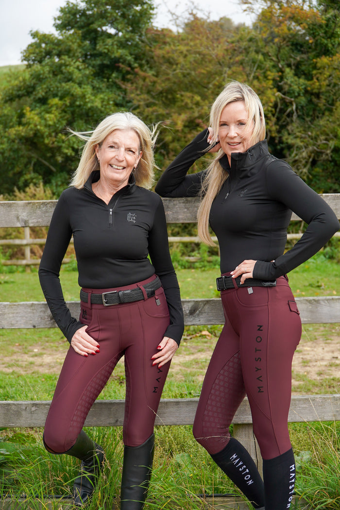 Premium breeches with a Full Silicone seat. Stretch high waisted Jodhpurs. Deep pockets, supportive, comfortable and compression quality fabric. Elegant detailing with subtle branding.  wine burgundy dark red