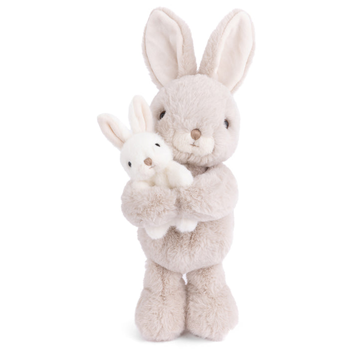 Light beige plush bunny holding a smaller bunny, long ears, soft stuffed toy