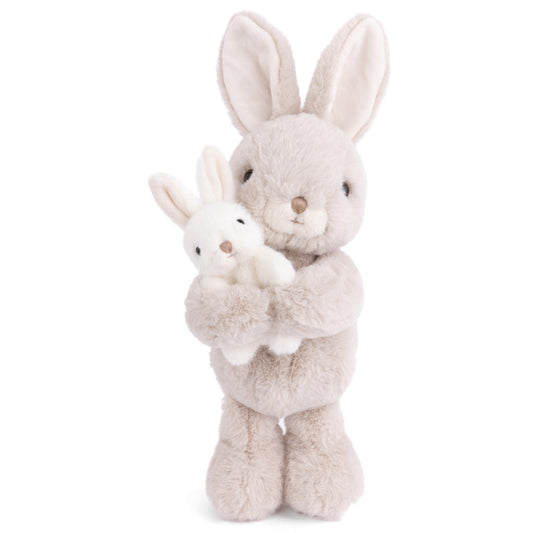 Light beige plush bunny holding a smaller bunny, long ears, soft stuffed toy