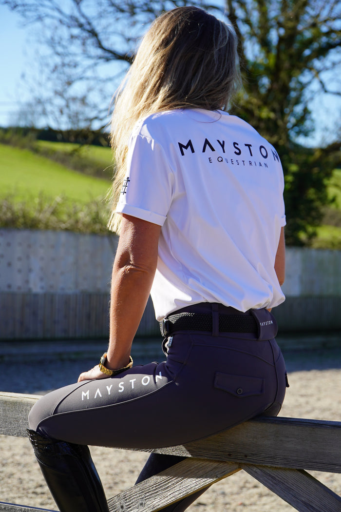 white luxury quality t shirt and fabric is specially crafted for active duty, providing flexibility and ease of movement for any busy lifestyle. An ideal choice for a day at the yard, in the saddle, or during your grooming duties, its loose-fitting design guarantees complete freedom. high gloss black silicone branding
