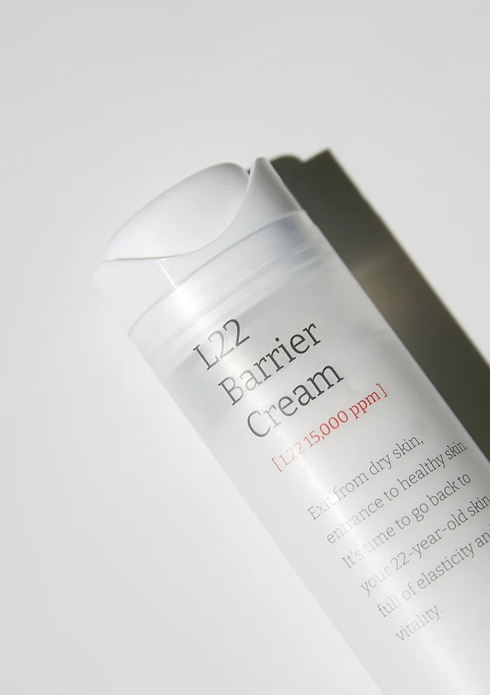 L22 Barrier Cream container on a light gray background